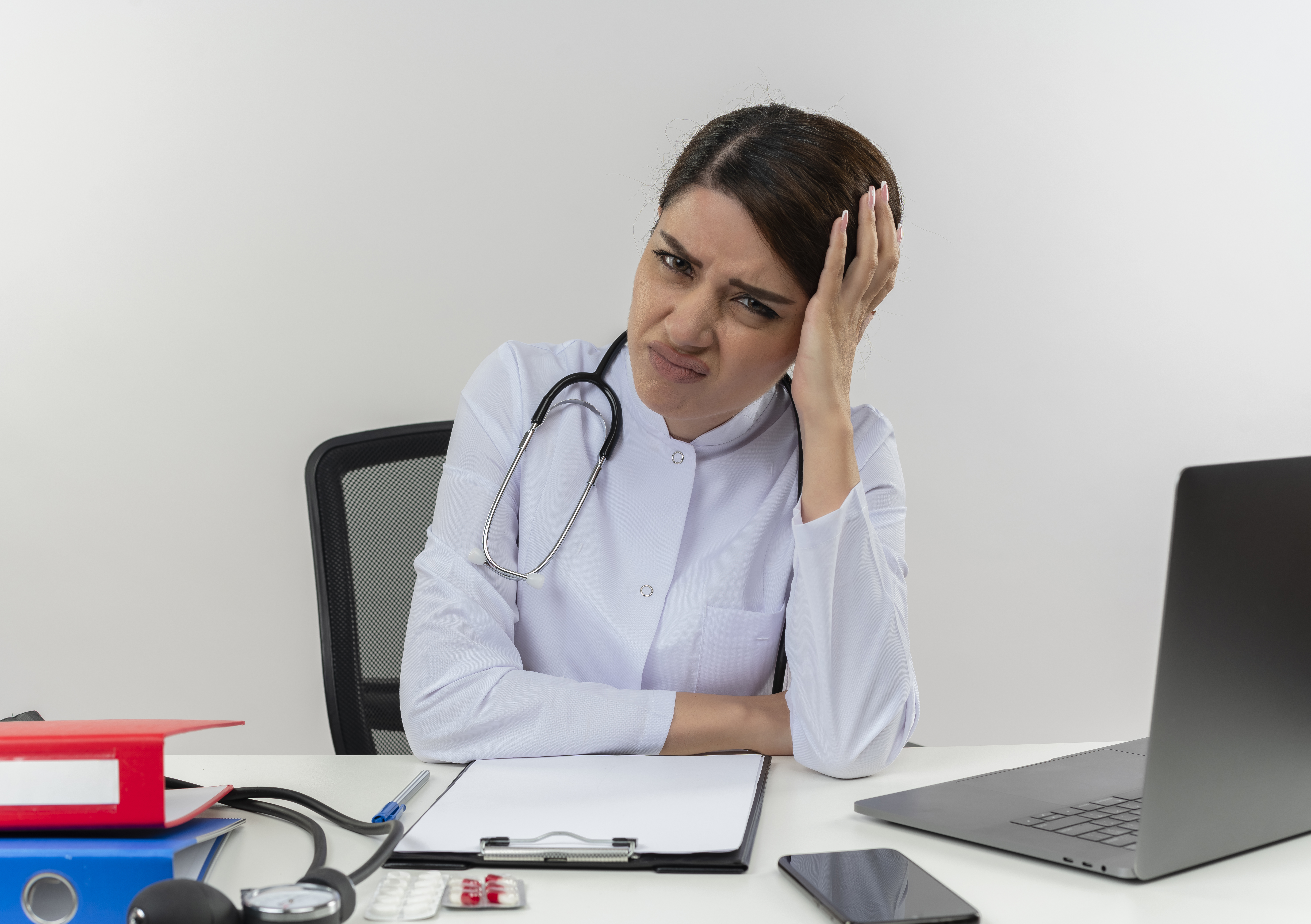 Doctor facing prior authorization frustrations with paperwork